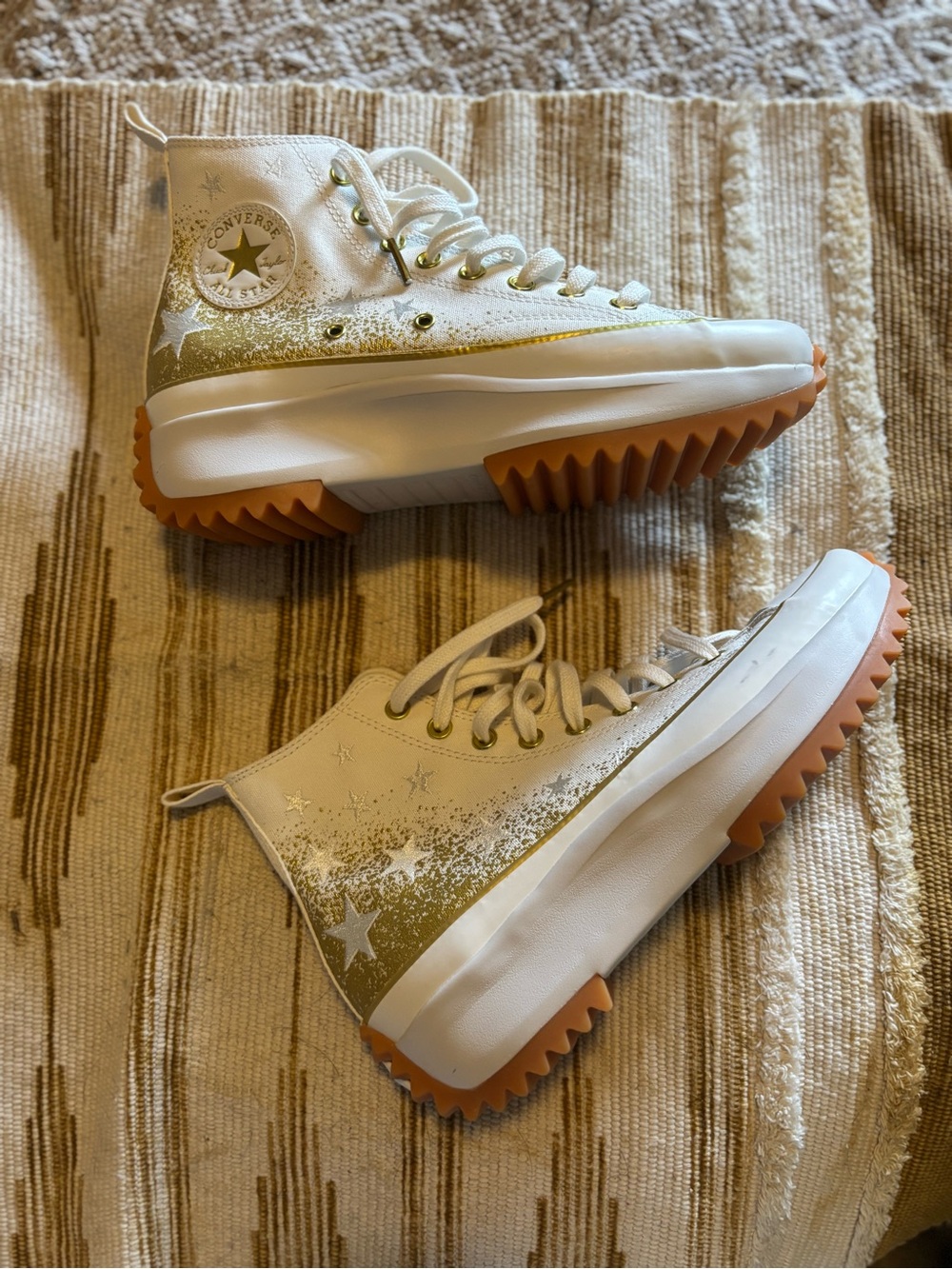 Converse Women’s White High-Top Sneakers with Gold Accents